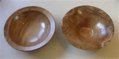 2 walnut bowls by Mike Turner. One of them won the Highly Commended certificate